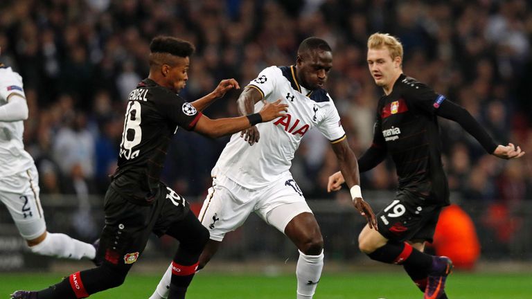 Tottenham midfielder Moussa Sissoko vies with Leverkusen's Wendell and Julian Brandt