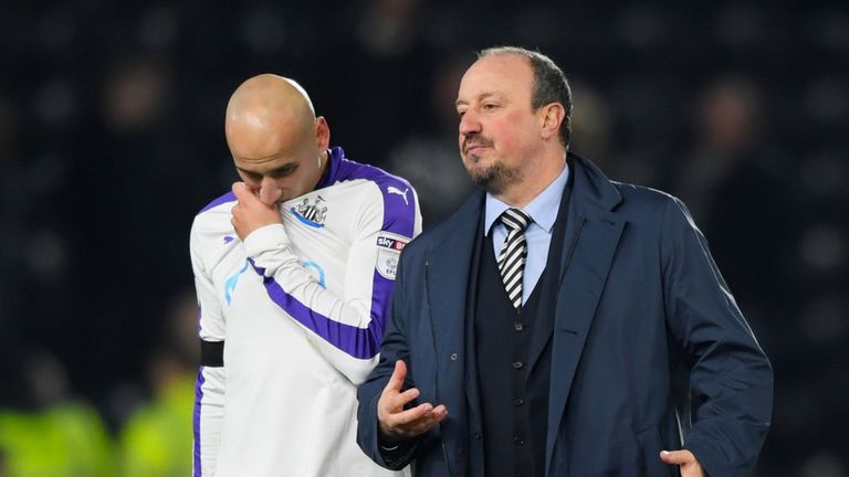 Magpies boss Rafa Benitez leaves the pitch alongside Jonjo Shelvey after the defeat