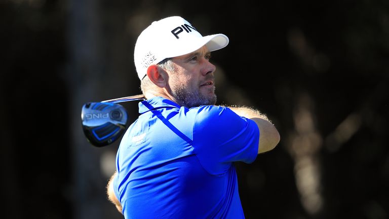 Lee Westwood tees off on the 9th hole