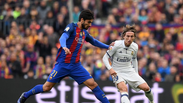 Andre Gomes and Luka Modric tangle for possession on Saturday afternoon