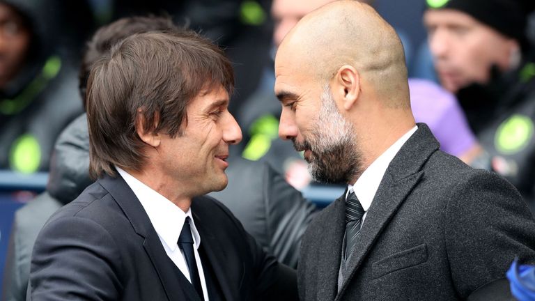 Antonio Conte and Pep Guardiola embrace 