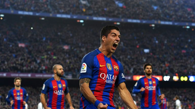 Luis Suarez celebrates his opening goal during El Clasico