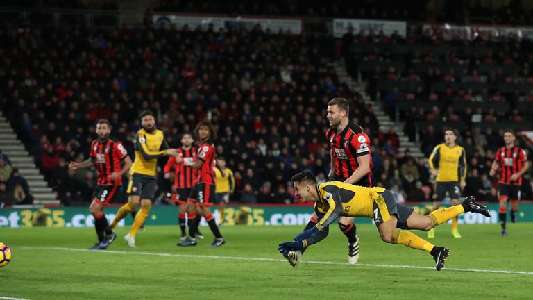 Arsenal's Alexis Sanchez scores his side's first goal 