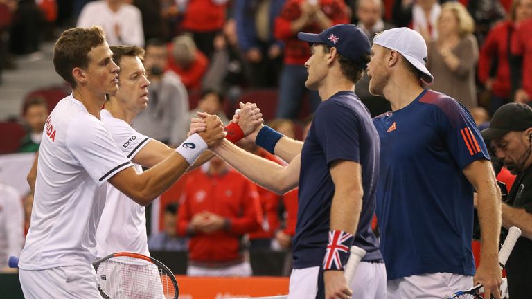 Vasek Pospisil and Daniel Nestor [left] were beaten in four sets by the British pair