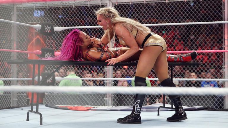 Sasha Banks and Charlotte became the first women to wrestle inside Hell in a Cell