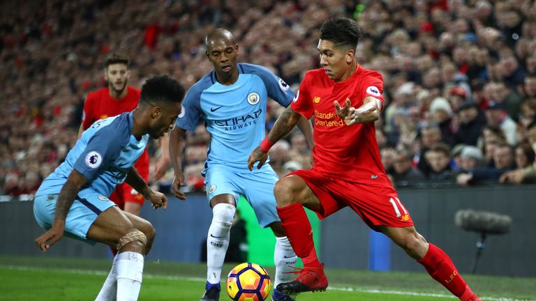 Roberto Firmino (right) can make up for the departure of compatriot Philippe Coutinho at Liverpool