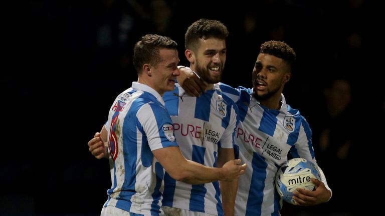 Huddersfield Town's Tommy Smith (centre) is congratulated after scoring the winner against Aston Villa