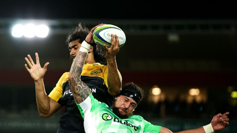 Michael Fatialofa competes with Elliot Dixon at a lineout