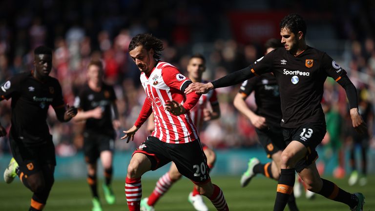Andrea Ranocchia (right) pulls back Manolo Gabbiadini
