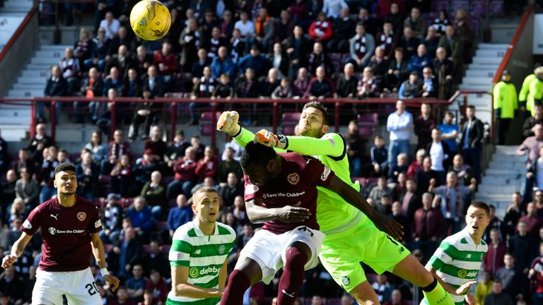 Celtic goalkeeper Craig Gordon punches clear
