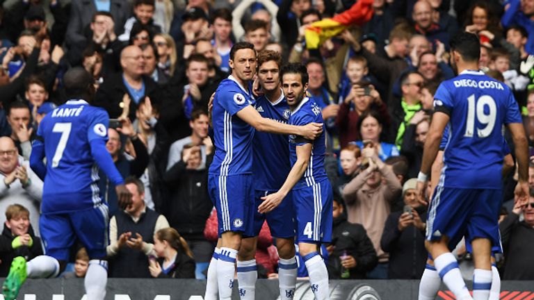 Cesc Fabregas celebrates scoring his sides first goal