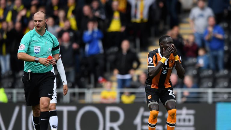 Oumar Niasse struggled to hide his dismay at Bobby Madley's decision