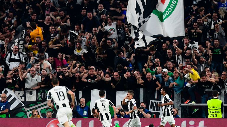 Dybala (2nd right) celebrates scoring against Barcelona