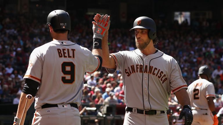 Madison Bumgarner (right) hit two home runs in a losing cause for San Francisco