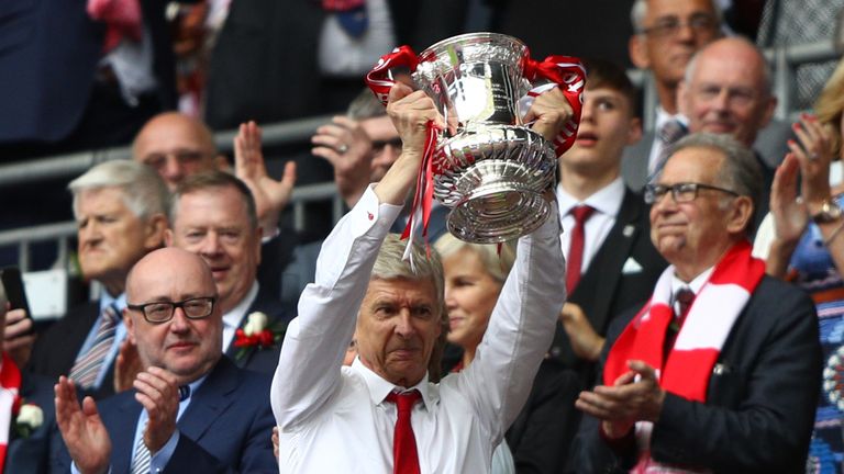 Wenger lifts the FA Cup trophy at Wembley