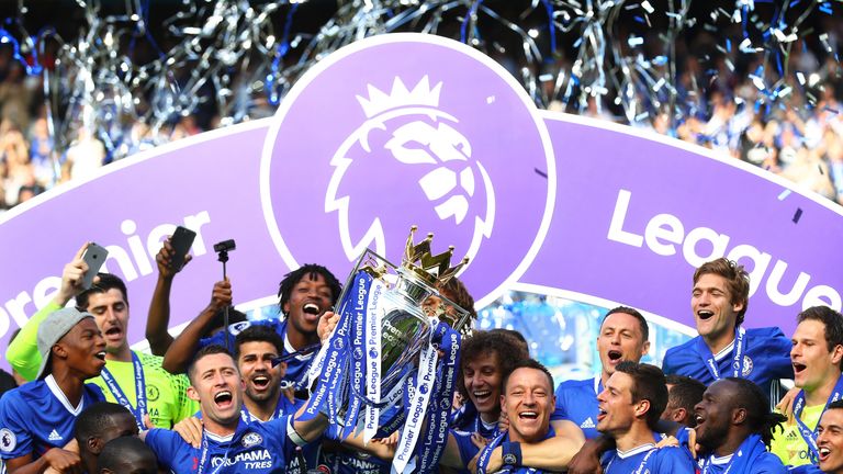 Gary Cahill and John Terry lift the Premier League trophy at Stamford Bridge