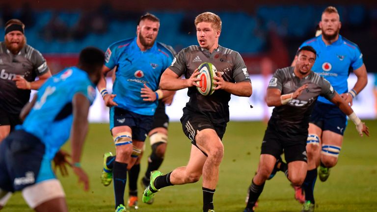 Crusaders' Jack Goodhue attacks the bulls defence