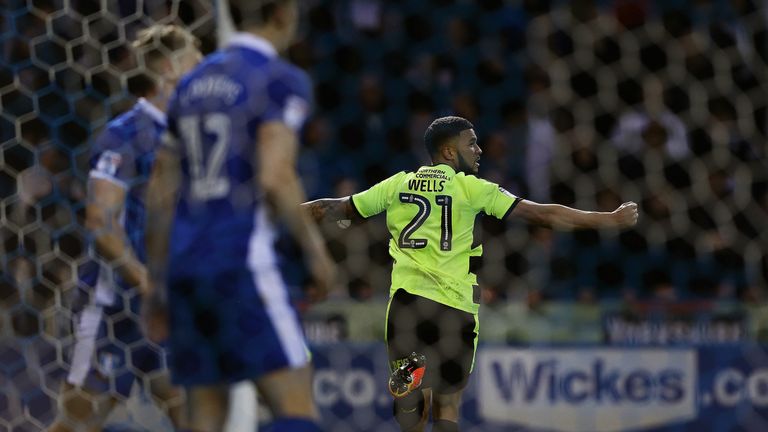 Nahki Wells of Huddersfield Town celebrates his equaliser at Hillsborough