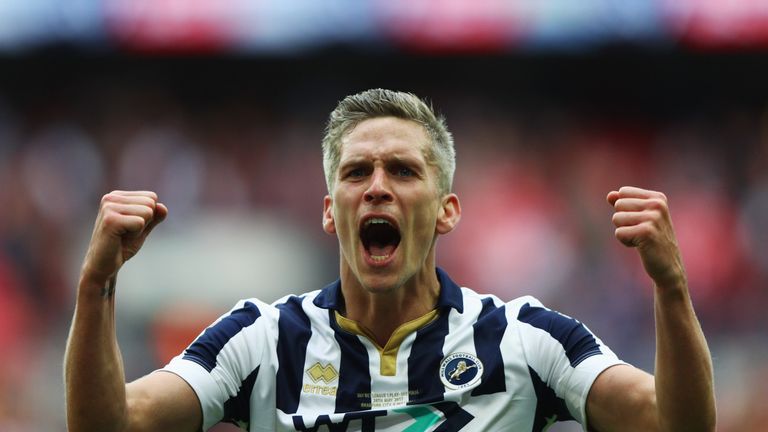 Millwall goalscorer Steve Morison celebrates promotion