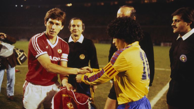Bryan Robson shakes hands with Barcelona skipper Diego Maradona before United's European Cup Winners' Cup match at Old Trafford in March 1984