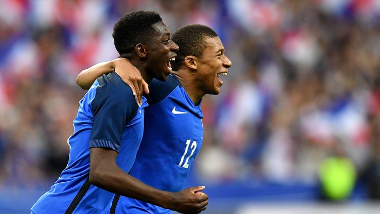 Mbappe congratulates Ousmane Dembele following his goal for France against England in Paris