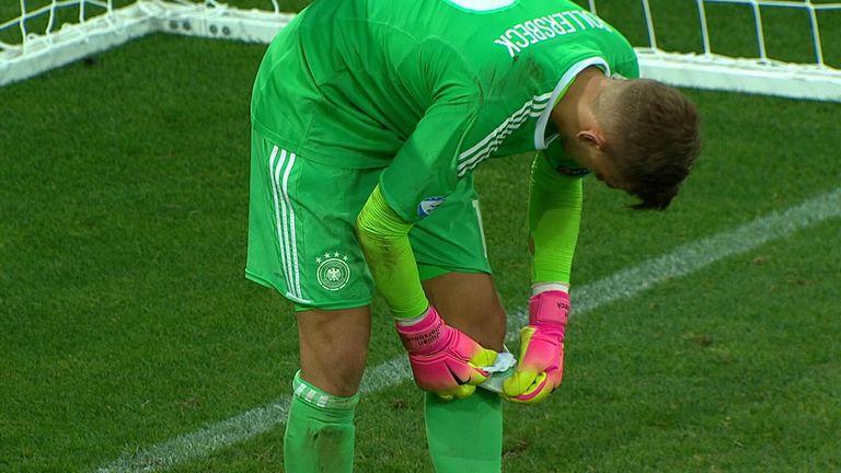 Germany 'keeper Julian Pollersbeck consults his notes during the penalty shootout with England in the U21 Euros semi-finals