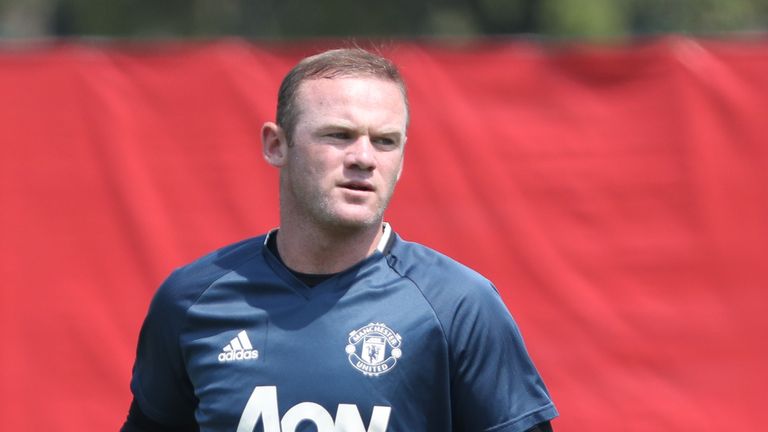 Ryan Giggs believes Wayne Rooney may stay at Manchester United beyond this summer