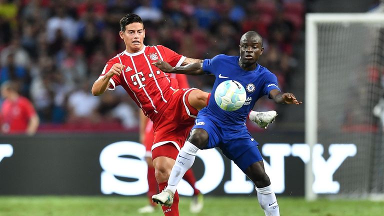 James Rodriguez and N'Golo Kante challenge for the ball in Singapore