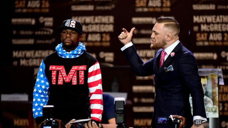 Conor McGregor taunts Floyd Mayweather on stage