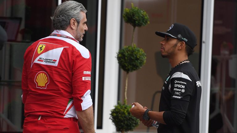 Hamilton pictured with Ferrari boss Maurizio Arrivabene at last year's Austrian GP