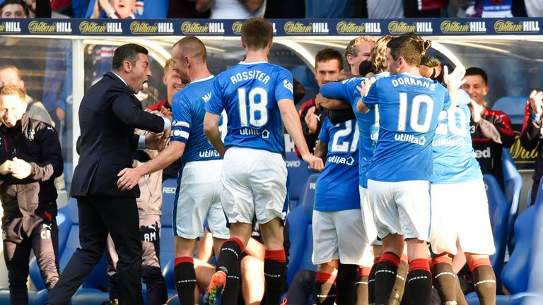 Rangers boss Pedro Caixinha (left) leads the celebrations after Bruno Alves' goal