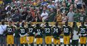 Packers call on fans to link arms