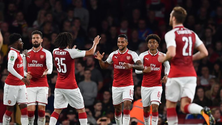 Theo Walcott celebrating his goal for Arsenal against Doncaster
