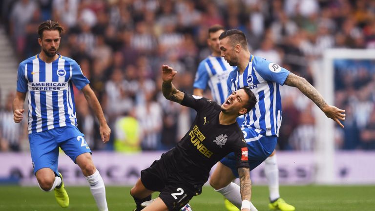 Joselu is challenged by Shane Duffy in the first half