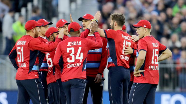 England celebrate after Plunkett (second right) runs out Chris Gayle at Chester-le-Street
