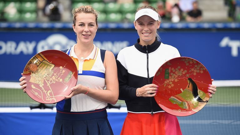 Wozniacki (right) claimed her maiden victory of the year 