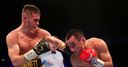 Burnett beats 'ZZ' to unify belts