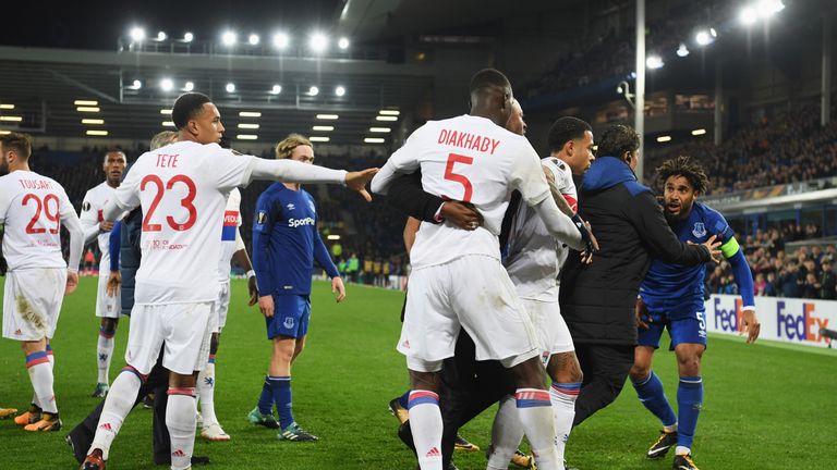 Furious Williams (R) was led away by Everton's goalkeeping coach Patrick Lodewijks