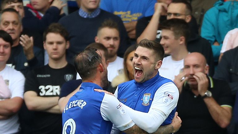 Gary Hooper celebrates his goal against Leeds with team-mate Steven Fletcher