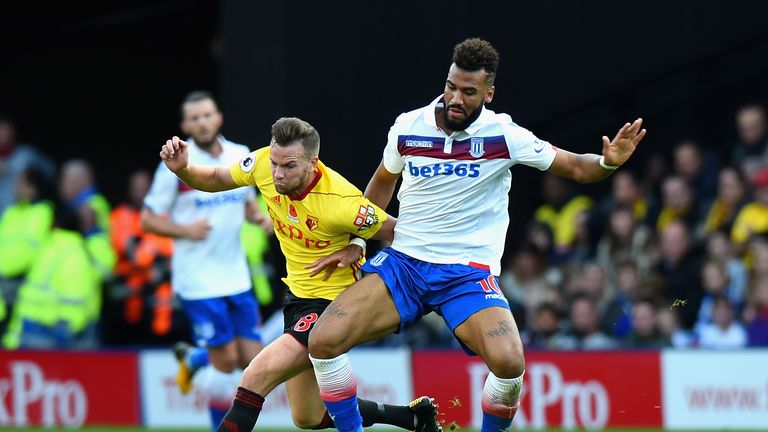 Eric Maxim Choupo-Moting competes for the ball with Tom Cleverley