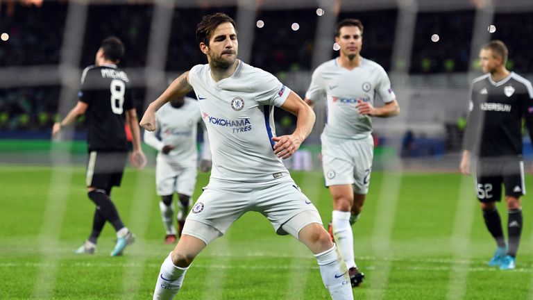 Chelsea midfielder Cesc Fabregas (C) celebrates after scoring from the penalty spot