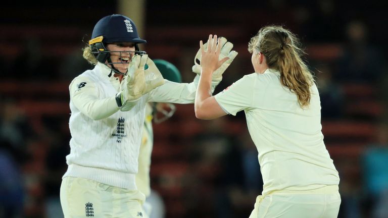 Taylor and Anya Shrubsole celebrate the dismissal of Elyse Villani during the Ashes