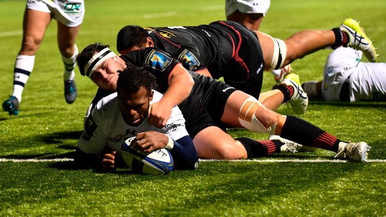 Alvereti Raka dives over the line to score his second try from close range