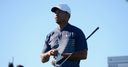 Tiger grinds it out as Palmer leads