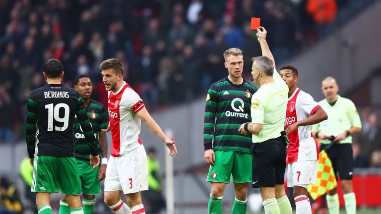 Nicolai Jorgensen of Feyenoord is shown a red card by referee Bjorn Kuipersduring