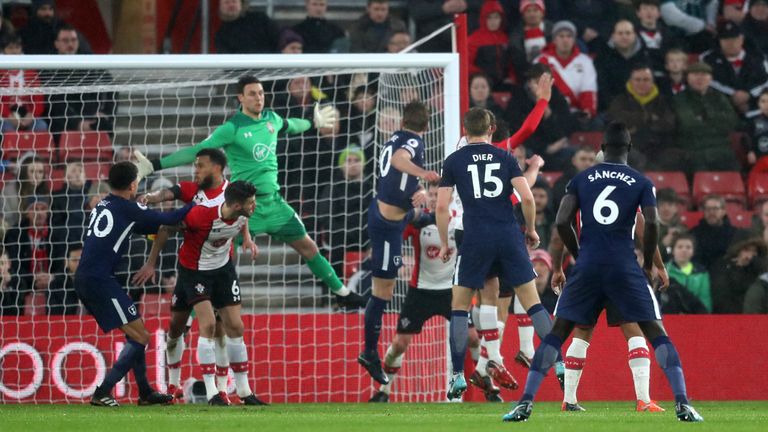 Kane (centre) scores his side's equaliser against Southampton
