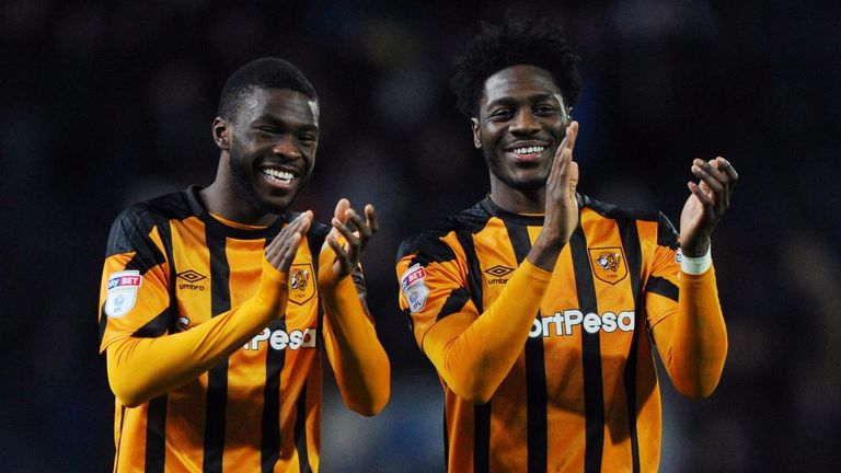 Fikayo Tomori and Ola Aina of Hull City celebrate at full-time