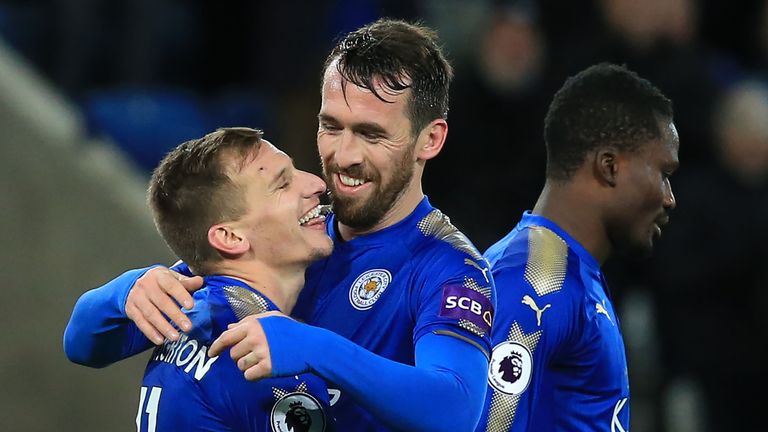 Marc Albrighton celebrates scoring Leicester's third goal with Christian Fuchs