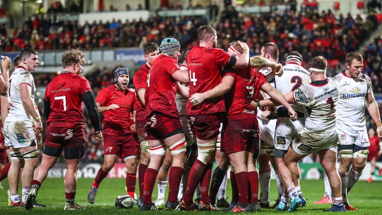 The Munster pack celebrate after earning a penalty try from a series of scrums