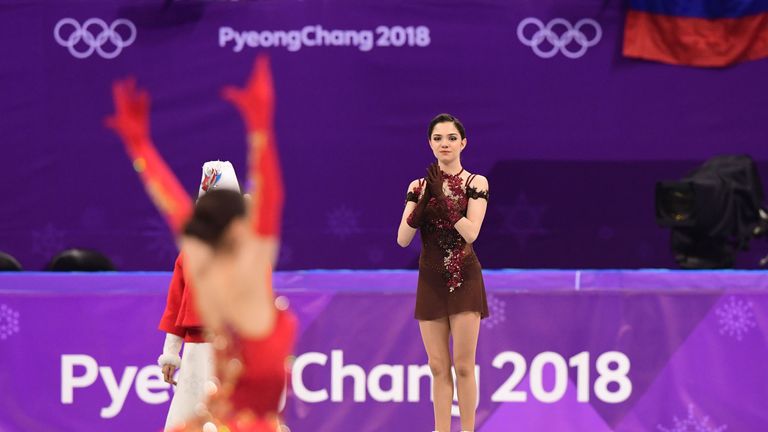 Gold medallist Zagitova celebrates (L) as silver medallist Evgenia Medvedeva watches on